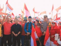 Menyemarakkan HUT Kemerdekaan RI Ke-79, Sekdako Hadiri Parade Bendera Merah Putih