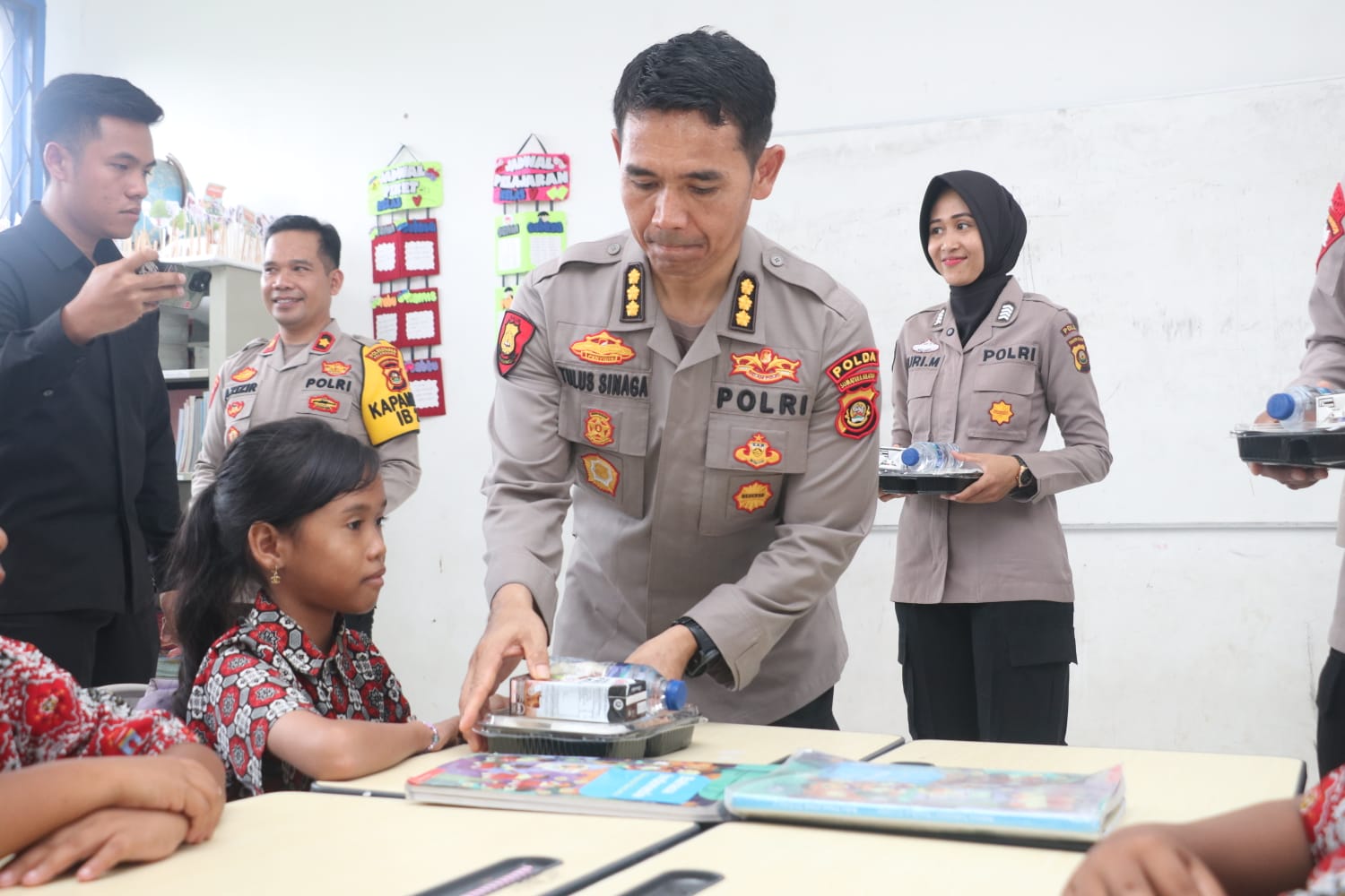 Program Pemberian makan bergizi pada Pelajar tindak lanjut Asta Cinta President RI Di SDN. 036.